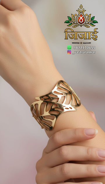Gold cutout leaf cuff bracelet