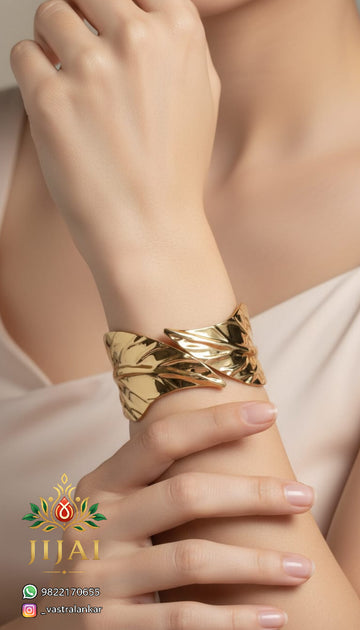 Gold crossover leaf cuff bracelet