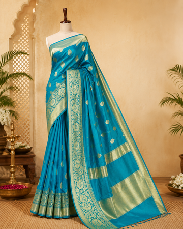 Teal Blue Silk Saree with Golden-Green Leaf Border
